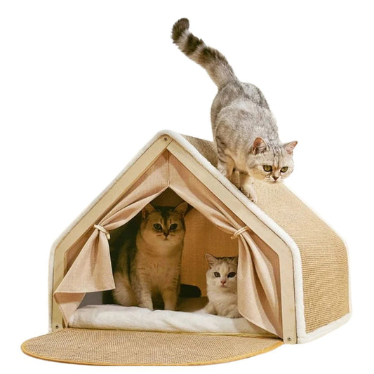 Three cats inside a beige pet house with a white background